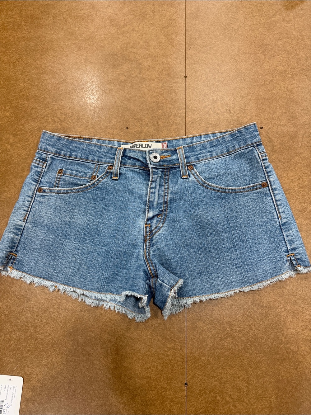 Y2K Vintage Levi's Super Lowrise Light Raw Hem Blue Denim Cutoff Shorts Sz 9